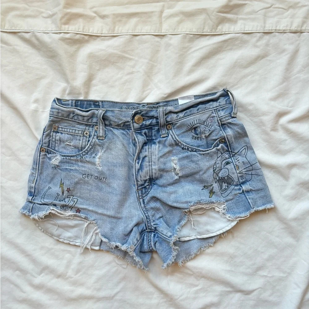 American Eagle Outfitters ripped distressed doodle festival shorts